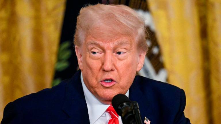 US President Donald Trump speaks during a celebration of military mothers in the East Room of the White House in Washington, DC, on May 8, 2025. aFPpix