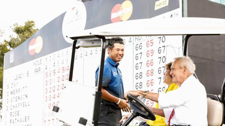 Hideki Matsuyama greets the late Arnold Palmer during the 2016 Arnold Palmer Invitational presented by Mastercard. Credit Getty Images