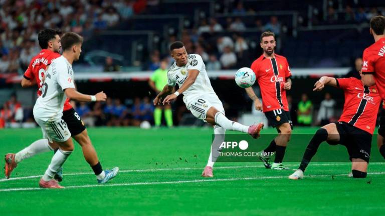 Real Madrid's French forward #10 Kylian Mbappe controls the ball during the Spanish league football match between Real Madrid CF and Real RCD Mallorca at the Santiago Bernabeu stadium in Madrid on August 30, 2025. - AFP