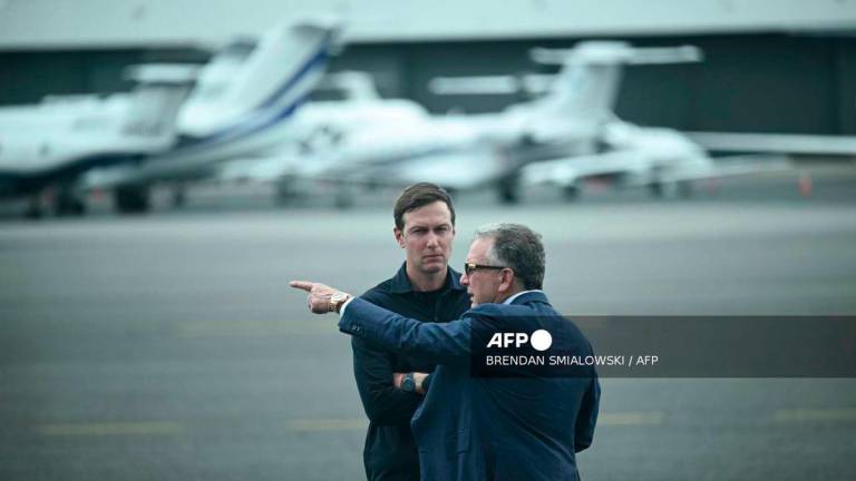 (FILES) US special envoy to the Middle East Steve Witkoff (R) and Jared Kushner await the arrival of President Donald Trump and First Lady Melania Trump at Teterboro Airport in Teterboro, New Jersey, on July 13, 2025. - AFP