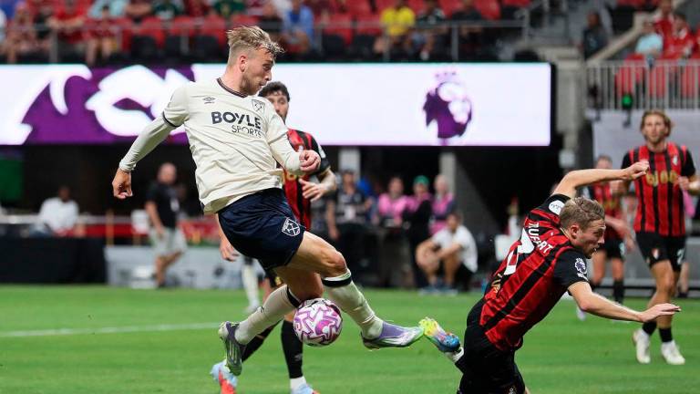 Jarrod Bowen of West Ham United has his shot blocked by Adrien Truffert of AFC Bournemouth during the Premier League Summer Series match between AFC Bournemouth and West Ham United FC. - AJ Reynolds / GETTY IMAGES NORTH AMERICA / AFP