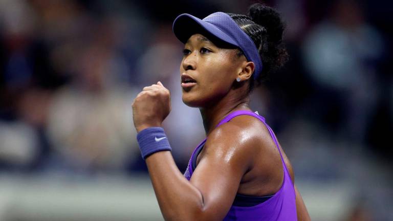 Naomi Osaka of Japan celebrates a point against Amanda Anisimova of the United States during their Women's Singles Semifinal match on Day Twelve of the 2025 US Open at USTA Billie Jean King National Tennis Center on September 4, 2025 in the Flushing neighborhood of the Queens borough of New York City. - Sarah Stier/Getty Images/AFPPIX