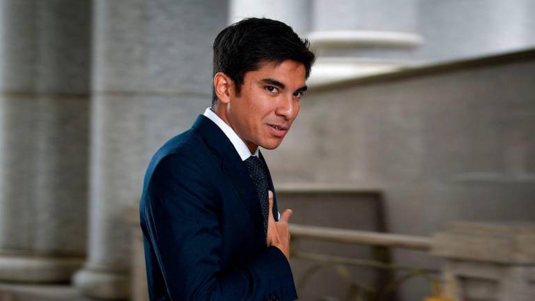 Ahli Parlimen Muar Syed Saddiq Syed Abdul Rahman tiba di Istana Kehakiman pagi ini untuk pendengaran rayuan hari kedua terhadap sabitan dan hukuman bagi empat pertuduhan pecah amanah, salah guna harta dan pengubahan wang haram dana Armada yang membabitkan beliau.- BERNAMA