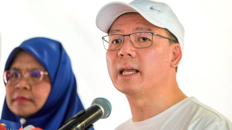 The Minister of Local Government and Development, Nga Kor Ming, speaking at a press conference after his visit to the Bandar Tasik Selatan Low-Cost Apartments today. - BERNAMA