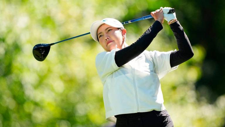 Miranda Wang of China plays her shot from the second tee during the third round of the FM Championship 2025 at TPC Boston on August 30, 2025 in Norton, Massachusetts. - Michael Owens / GETTY IMAGES NORTH AMERICA / AFP
