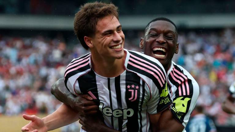 Juventus’ Turkish midfielder 10 Kenan Yildiz (L) is congratulated by Juventus’ French forward 20 Randal Kolo Muani after scoring his team’s third goal during the FIFA Club World Cup 2025 Group G football match between Italy’s Juventus and Morocco’s Wydad AC at the Lincoln Financial Field stadium in Philadelphia on June 22, 2025 - AFPpix
