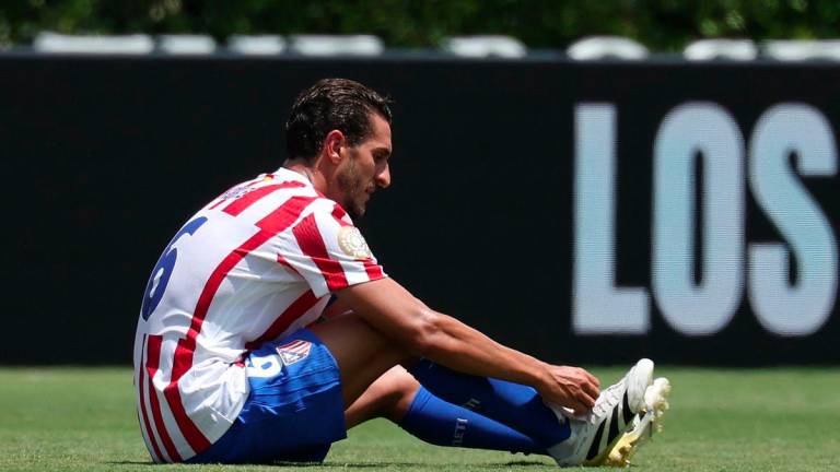 Atletico Madrid's Spanish midfielder #06 Koke reacts at the end of the FIFA Club World Cup 2025 Group B football match between Spain's Atletico de Madrid and Brazil's Botafogo at the Rose Bowl stadium in Los Angeles on June 23, 2025. - AFPPIX