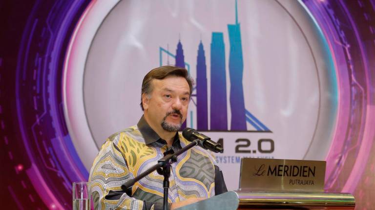 Second Finance Minister Datuk Seri Amir Hamzah Azizan delivers a speech at the Launch Ceremony of the Property Market Report for the First Half of 2025 in Putrajaya today. – BERNAMA