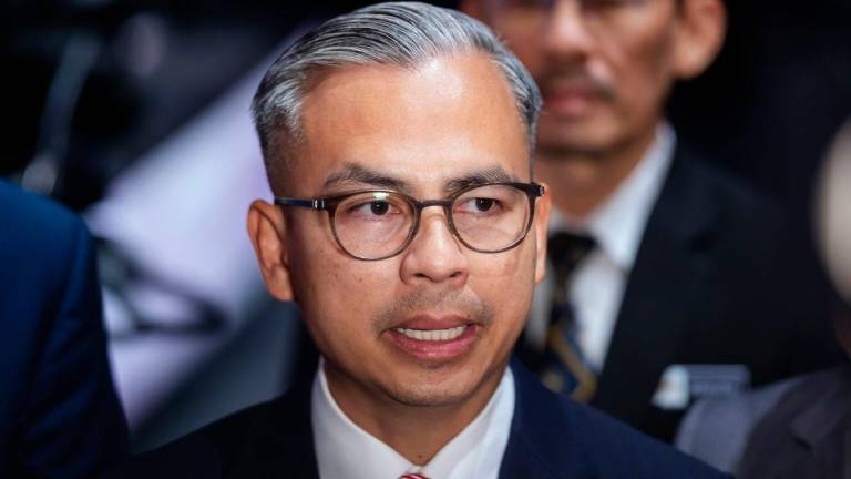 Communications Minister Datuk Fahmi Fadzil - Photo by BERNAMA