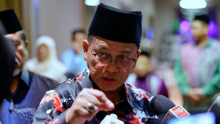 Menteri di Jabatan Perdana Menteri (Hal Ehwal Agama) Datuk Dr Mohd Na’im Mokhtar - fotoBERNAMA