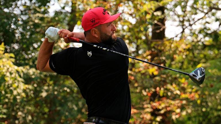Jon Rahm of Legion XIII plays his shot from the 17th tee on day three of LIV Golf Indianapolis at The Club at Chatham Hills on August 17, 2025 in Westfield, Indiana. - Justin Casterline/Getty Images/AFP