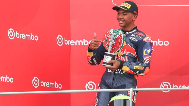 Hakim Danish on the podium of the Italian GP