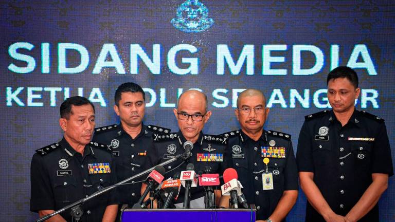 Selangor Police Chief Datuk Shazeli Kahar (centre) at a press conference regarding the attack on the son of former Economy Minister Datuk Seri Rafizi Ramli at the Selangor Police Contingent Headquarters today. – BERNAMA