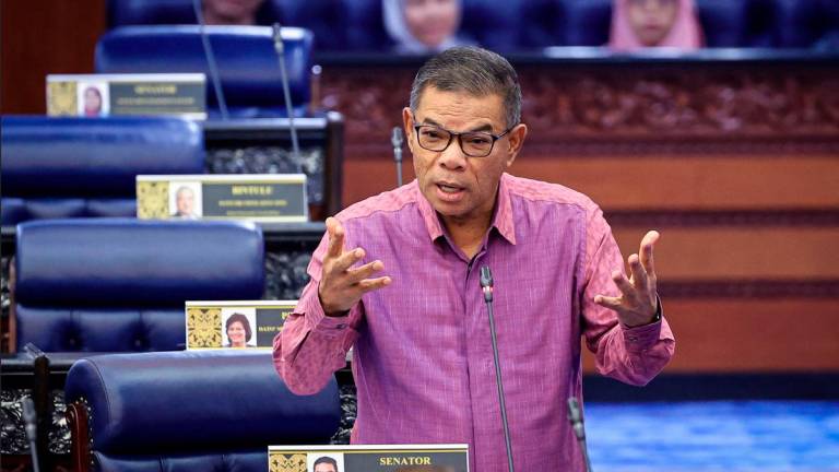 The Minister of Home Affairs, Datuk Seri Saifuddin Nasution Ismail, at the Second Meeting, Fourth Session of the 15th Parliament, Dewan Rakyat Conference in the Parliament Building today. - BERNAMA