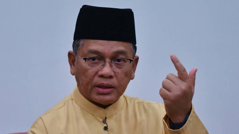 Minister in the Prime Minister’s Department (Religious Affairs), Datuk Dr Mohd Na’im Mokhtar, speaks to reporters at the Rai Ummah Bersama Komuniti programme today. - BERNAMA
