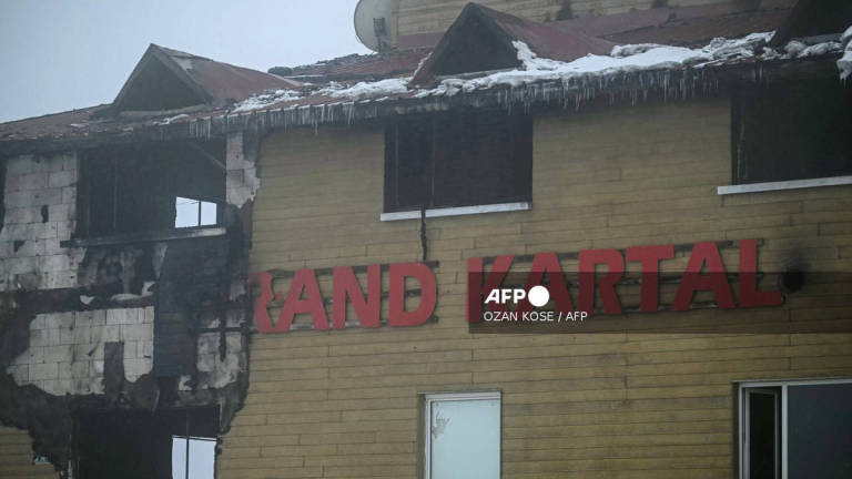 This photograph shows a view of a hotel building facade after deadly fire broke out at the Grand Kartal Hotel in the Kartalkaya Ski Resort in Bolu, on January 22, 2025. A huge fire killed at least 76 people on January 21, 2025, as it ripped through a hotel at a popular ski resort in northern Turkey that was packed with people enjoying the winter holidays, including families. - AFP