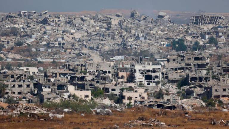 A view of destroyed buildings in Gaza, near the Israel-Gaza border, as seen from Israel, May 26, 2025. REUTERS/Amir Cohen