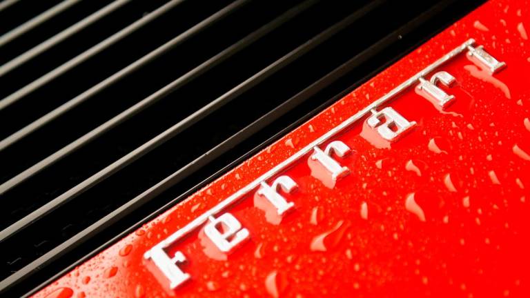 The Ferrari Insignia is seen at the back of a Ferrari Testarossa during a media tour of the Fullerton Concours d’Elegance in Singapore June 29, 2018. - REUTERS/Loriene Perera/File Photo