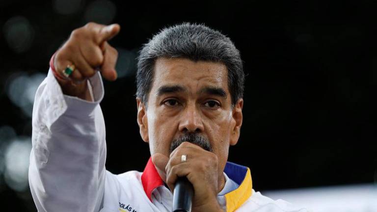 Venezuelan President Nicolas Maduro speaks to supporters during a rally in Caracas on August 3, 2024. Venezuela braced for fresh protests after President Nicolas Maduro’s disputed election victory was ratified on the eve -- and a growing number of nations recognized his opposition rival as the true winner. - (Photo by Pedro Rances Mattey / AFP)