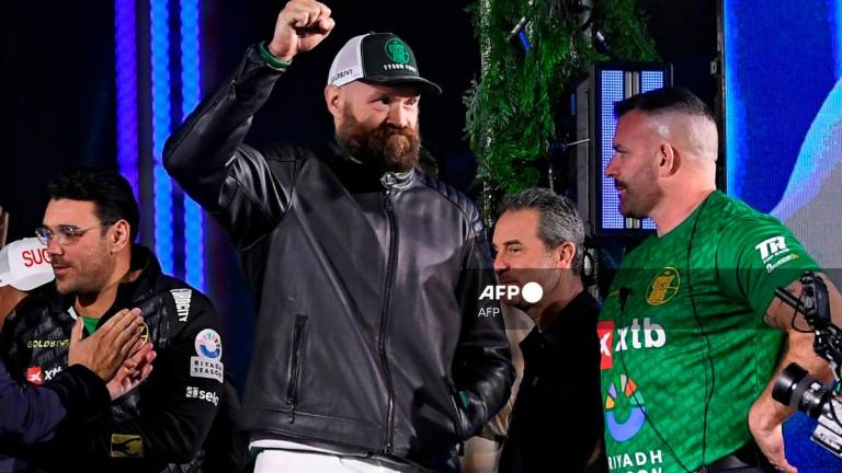 Britain's Tyson Fury (C) gestures on stage during the official weigh-in on the eve of his undisputed heavyweight world championship rematch against Ukraine's Oleksandr Usyk in Riyadh on December 20, 2024. - AFPpix