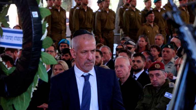 FILE PHOTO: Israeli Security Agency (Shin Bet) director Ronen Bar attends a memorial ceremony in connection with the Hamas attack on Oct 7, 2023 that sparked the war in Gaza, at the Mount Herzl military cemetery in Jerusalem, October 27, 2024. REUTERS Pix