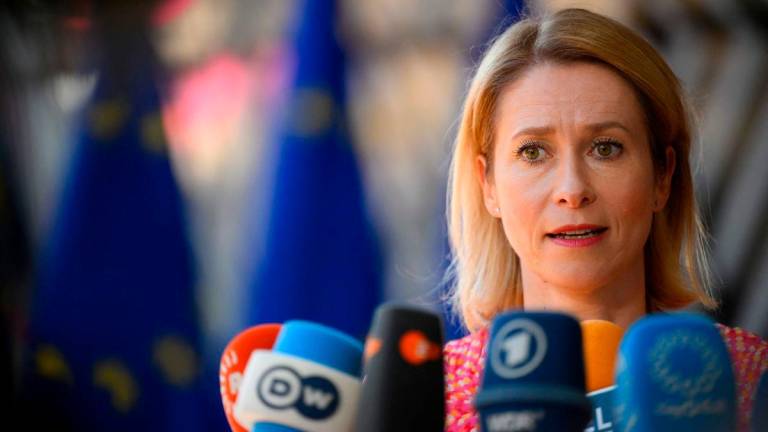 European Union for Foreign Affairs and Security Policy Kaja Kallas answers journalists questions as she arrives for a Defence Council meeting at the EU headquarters in Brussels on May 20, 2024.AFPpix