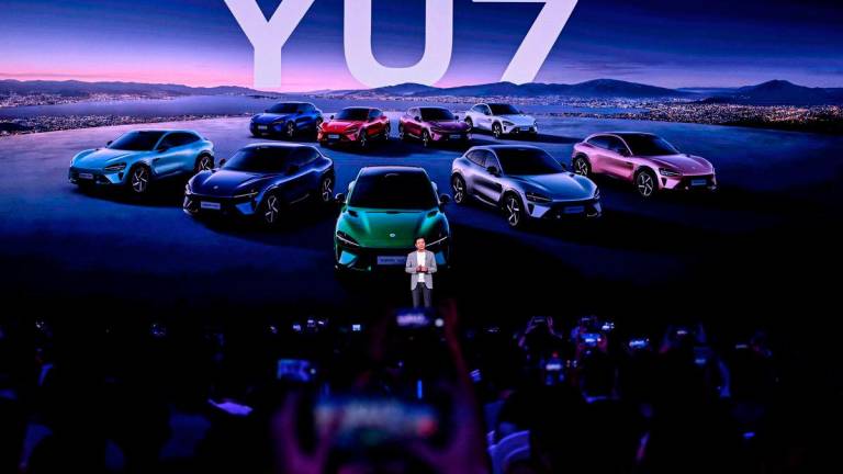 Lei Jun, Chairman and CEO of Chinese electronics company Xiaomi, introduces the Xiaomi YU7 car, during a launching event in Beijing on June 26, 2025. - AFPPIX