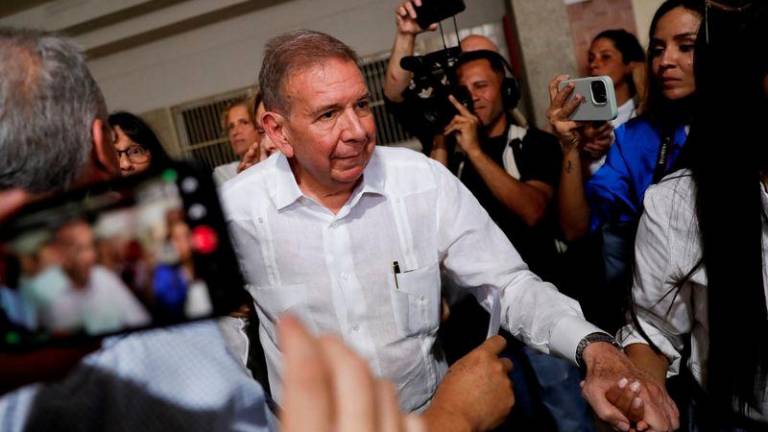 Venezuelan opposition presidential candidate Edmundo Gonzalez looks on on the day he casts his vote in the country's presidential election, in Caracas, Venezuela July 28, 2024. - REUTERSPIX