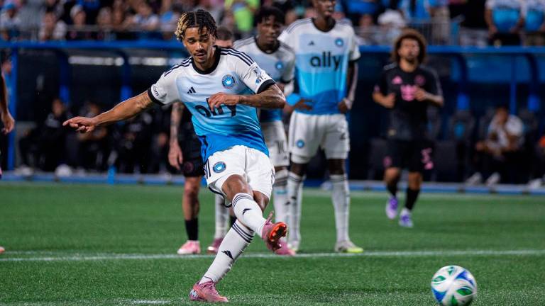 Charlotte, North Carolina, USA; Charlotte FC forward Idan Toklomati (17) takes a penalty kick during the second half against the Inter Miami at Bank of America Stadium. - Scott Kinser-Imagn Images
