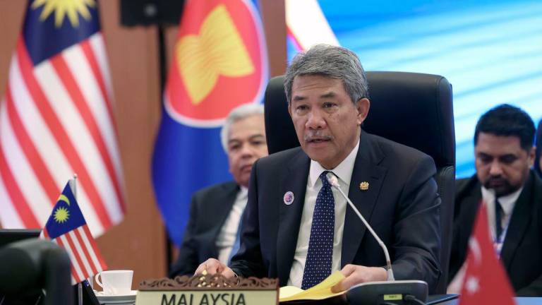 Foreign Minister Datuk Seri Mohamad Hasan (centre) chairs the trilateral meeting between Malaysia, Türkiye, and the ASEAN Secretariat in conjunction with the 58th ASEAN Foreign Ministers’ Meeting (AMM) and related meetings at the Kuala Lumpur Convention Centre today. - BERNAMAPIX