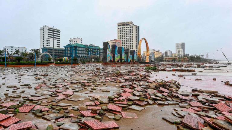 A view of Cua Lo beach damaged after typhoon Bualoi made a landfall in Nghe An province on September 29, 2025. Vietnam said it evacuated almost 30,000 residents from coastal areas on September 28, as Typhoon Bualoi hit the country’s steel-producing central belt. (Photo by Thai An / AFP)