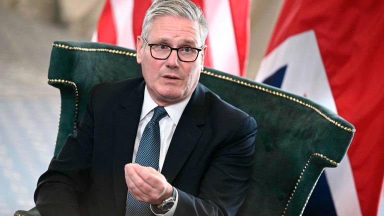 Britain's Prime Minister Keir Starmer talks with the media during a meeting with US President Donald Trump at the Trump Turnberry Golf Courses, in Turnberry south west Scotland on July 28, 2025. - Brendan SMIALOWSKI / AFP