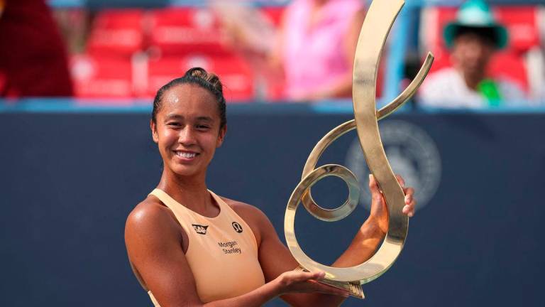 Leylah Fernandez of Canada poses with the championship trophy after winning a women’s singles championship match against Anna Kalinskaya on the final day of the Mubadala Citi DC Open 2025 at William H.G. FitzGerald Tennis Center on July 27, 2025 in Washington, DC. Photo by Scott Taetsch / GETTY IMAGES NORTH AMERICA / AFP