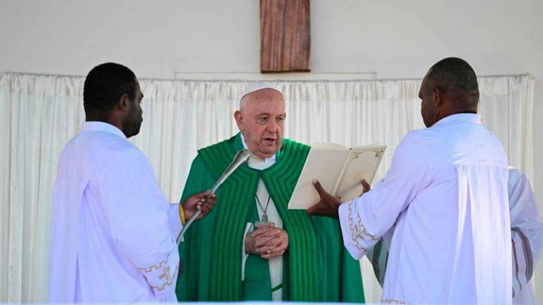 Pope Francis leads holy mass at Sir John Guise Stadium in Port Moresby, Papua New Guinea, on September 8, 2024. Pope Francis is leading holy mass at the Sir Guise Stadium during his four day visit to Papua New Guinea from September 6-9. - AFPPIX