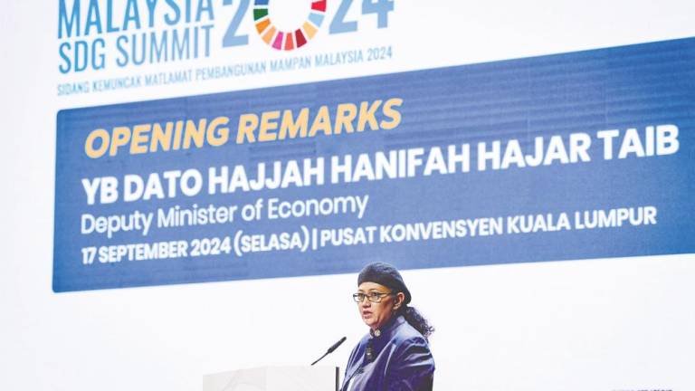 Hanifah delivering her opening address at the Malaysia Sustainable Development Goals Summit 2024 at Kuala Lumpur Convention Centre today.– Bernamapic