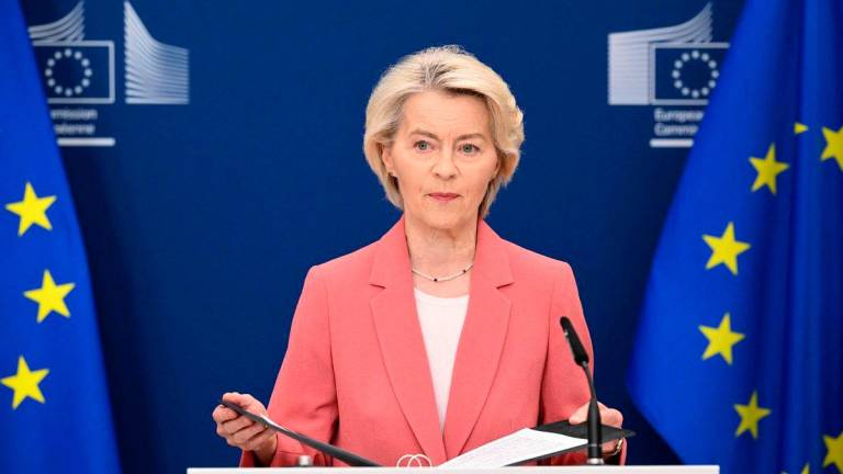 European Commission President Ursula Von der Leyen delivers a statement after a Russian missile and drone attack on apartment blocks of the Ukrainian capital Kyiv that killed at least 14 people, including three children, also hit the European Union mission’s building, at the EU headquarters in Brussels on August 28, 2025. (Photo by Nicolas TUCAT / AFP)