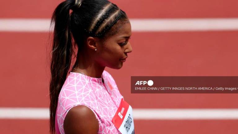 Gabby Thomas looks on before the Toyota Women's 200m final during the 2025 USATF Outdoor Championships at Hayward Field on August 03, 2025 in Eugene, Oregon. - Emilee Chinn/Getty Images/AFPPIX