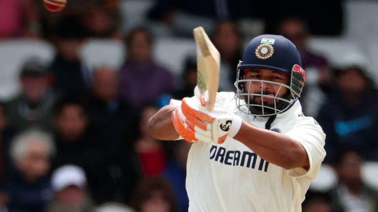 India's Rishabh Pant plays a shot on day four of the first cricket test match between England and India at Headingley cricket ground in Leeds, northern England on June 23, 2025. - AFPPIX