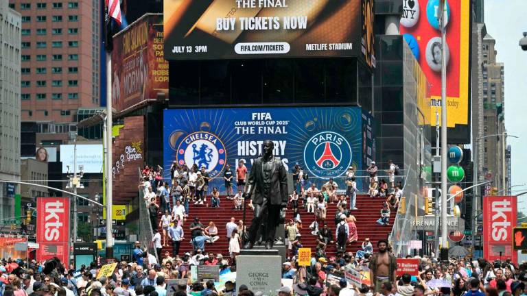 Advertising for the FIFA Club World Cup final match between France’s Paris Saint Germain and England’s Chelsea is displayed on a screen at Times Square in New York on July 12, 2025 - Photo by JUAN MABROMATA / AFP