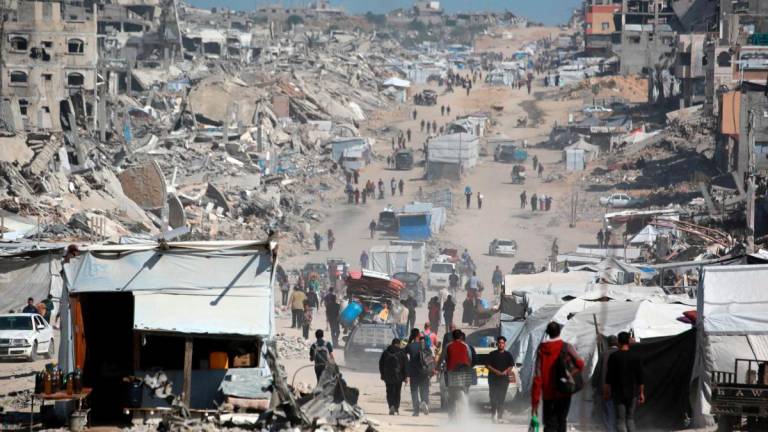 Palestinians carry their belongings as they flee Gaza City on May 16, 2025. Gaza’s civil defence agency said on May 16 that 50 people had been killed in Israeli strikes on the Palestinian territory since midnight. AFPpixs