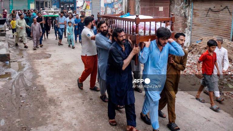 Residents and relatives carry the coffins of victims who died in flash floods in Sialkot, in Punjab province, on June 28, 2025. Flash flooding in Pakistan's mountainous northwest has killed 11 people, including several children, at the start of the monsoon season, disaster management officials said. - AFPpix
