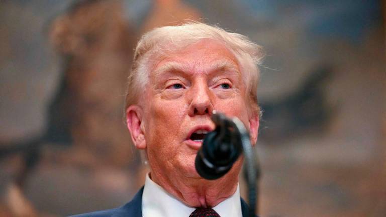 US President Donald Trump speaks after signing an executive order restarting the Presidential Fitness Test in public schools in the Roosevelt Room of the White House in Washington, DC, on July 31, 2025. Photo by Jim WATSON / AFP