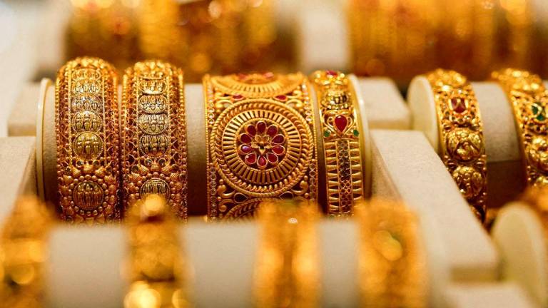 Gold bangles are displayed at a jewellery store in Mumbai, India, March 20, 2025. REUTERS