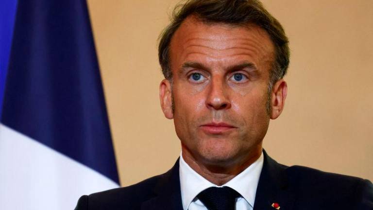 French President Emmanuel Macron looks on as he delivers a speech to affirm the spirit of freedom that founded the 1905 law as the 120th anniversary of the law on the separation of Church and State approaches, during a visit at the Grand Loge of France (GLDF), oldest French Masonic Obedience, in Paris, France, May 5, 2025. REUTERSpix