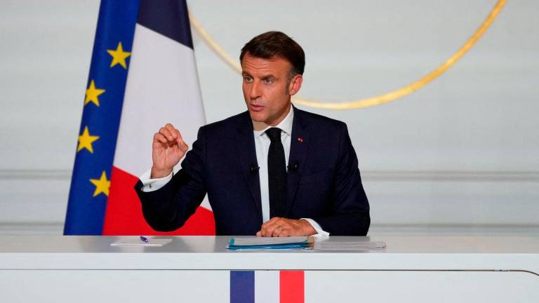 French President Emmanuel Macron holds a press conference at the Elysee Palace, in Paris, Friday, June 13, 2025. REUTERSpix