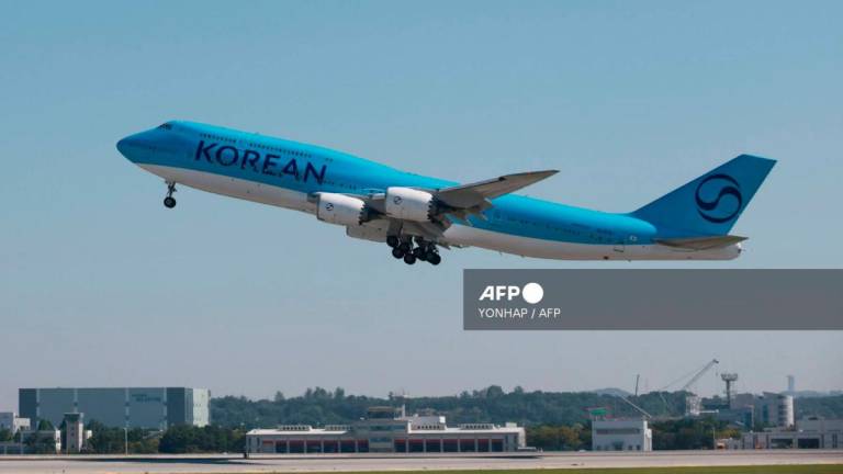 A chartered Korean Air Boeing 747-8I aircraft departs from Incheon International Airport to the United States on September 10, 2025, to repatriate hundreds of South Korean workers detained in an immigration raid. - YONHAP / AFP
