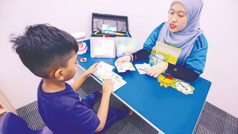 Kok said activities such as play and conversation are vital for children to develop communication skills in a natural and engaging way. – ADIB RAWI YAHYA/THESUN