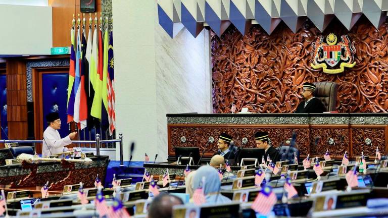 Prime Minister Datuk Seri Anwar Ibrahim answers questions during the Second Meeting of the Fourth Session of the 15th Parliament in the Dewan Rakyat, Parliament Building, today. - BERNAMA