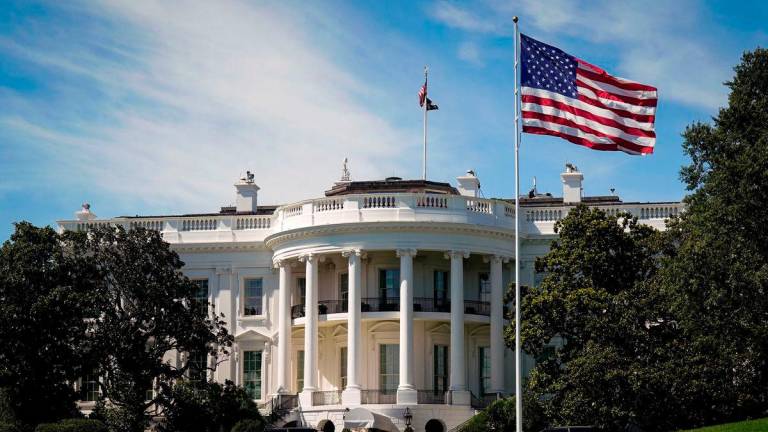 FOTO FAIL: Pemandangan umum White House ketika konvoi Presiden Amerika Syarikat Donald Trump pulang selepas lawatan ke Trump National Golf Club, di Washington, D.C., Amerika Syarikat, 20 Julai 2025 - REUTERS