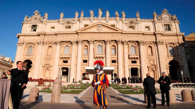 A Swiss Guard stands in Saint Peter’s Square, on the day Pope Leo XIV holds his inaugural Mass, at the Vatican, May 18, 2025. REUTERSpix